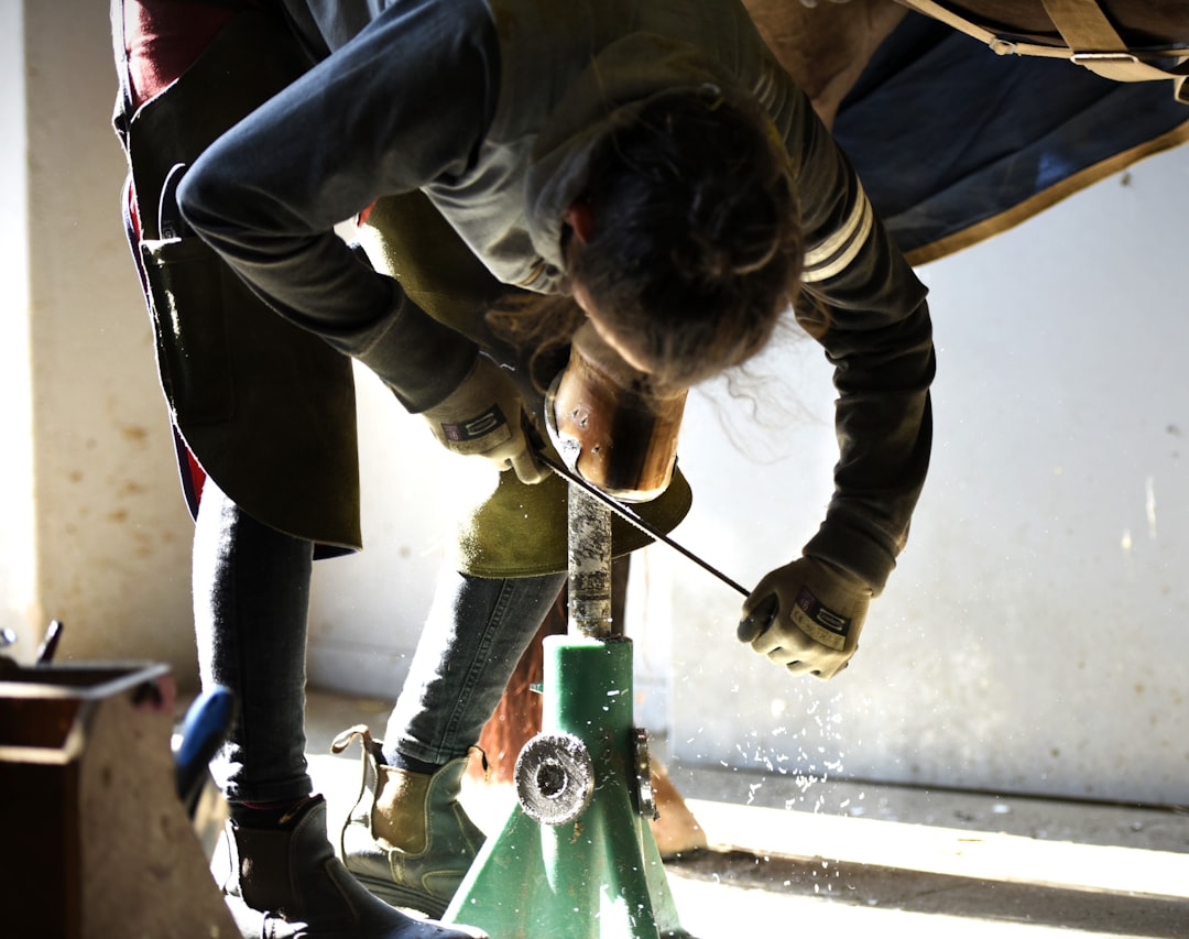 A man riding a skateboard on top of a wooden table