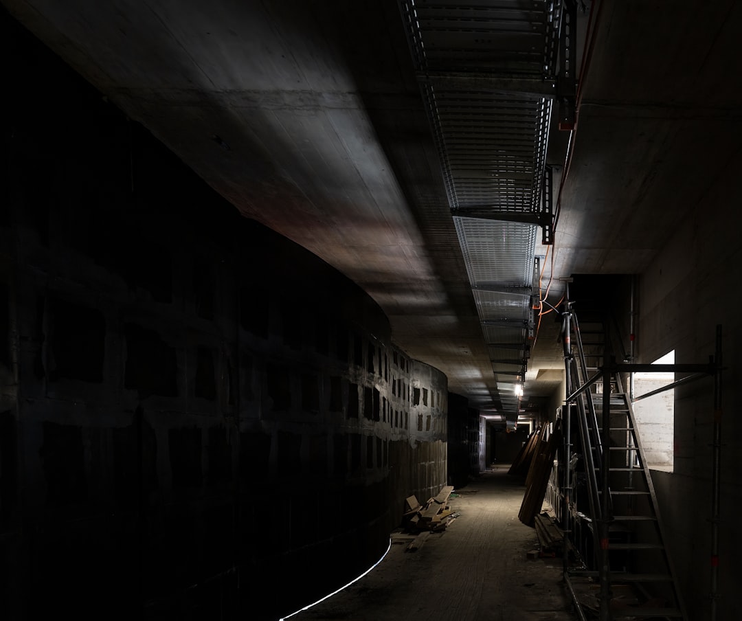 black and white tunnel with stairs