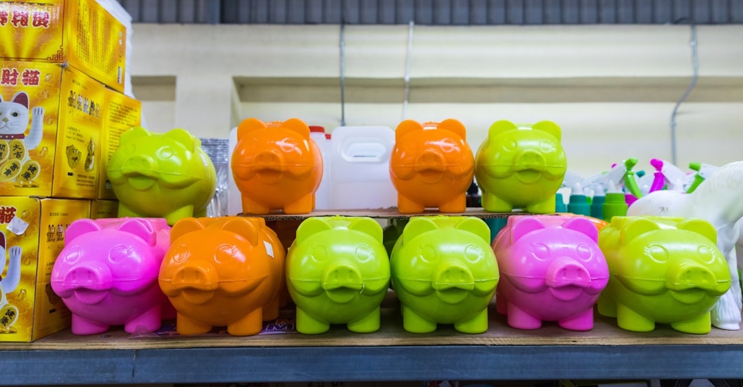 green and pink plastic pig toy